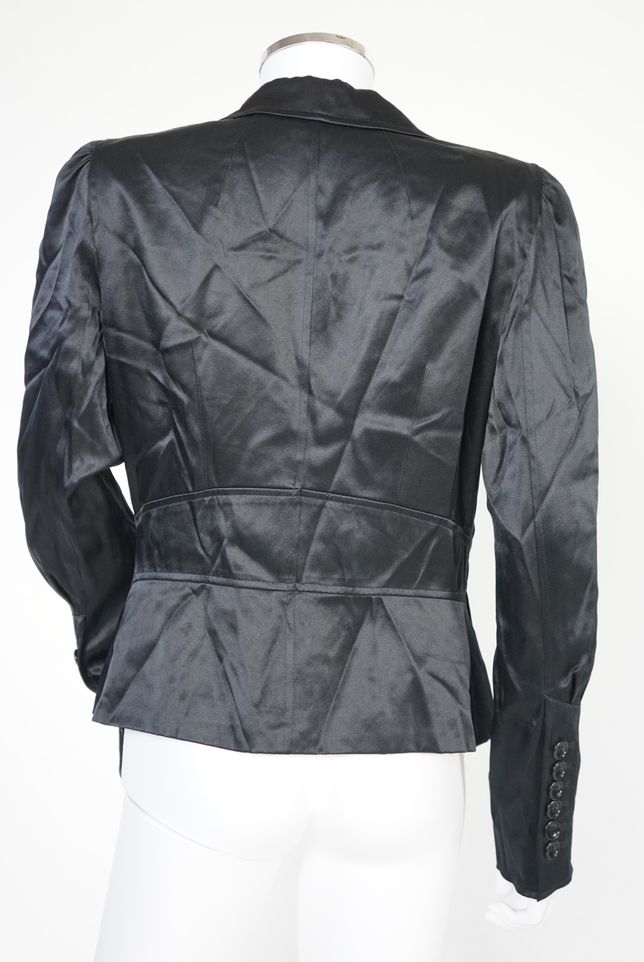 A DKNY red lady's coat and a DKNY satin jacket, coat size 6, jacket size 8